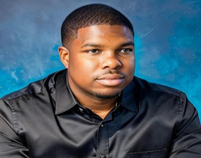 man headshot blue background