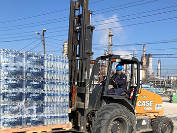 a truck carrying bottles