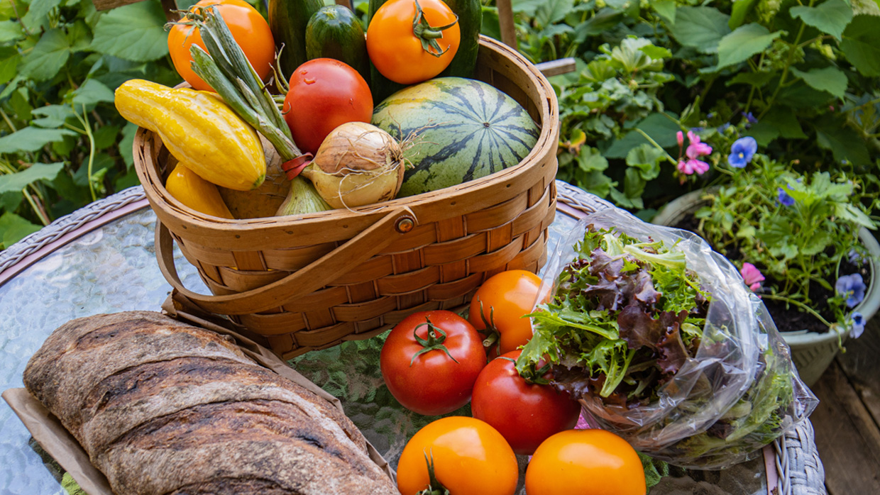 table with a basket full of vegetables