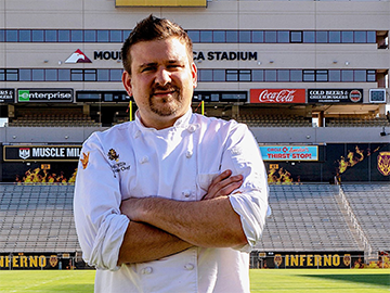White man with chef uniform at stadium