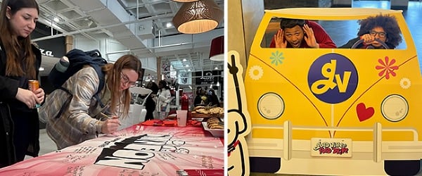 SUNY Plattsburgh students celebrating their dining team by signing a banner and posing for photos.