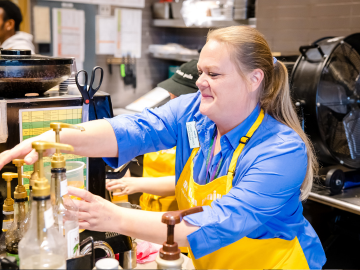 woman serving drink
