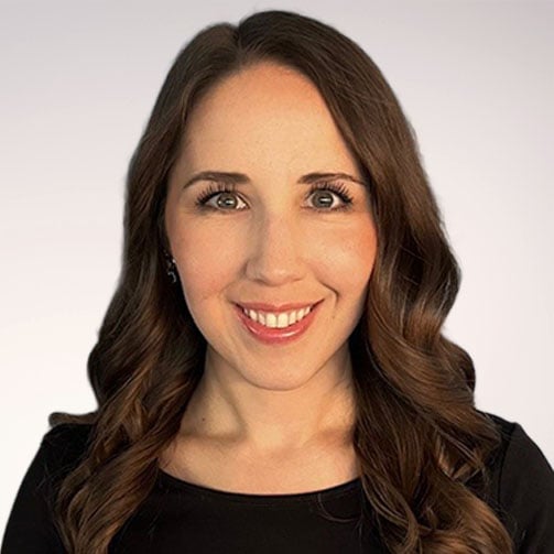 young dark brown haired woman smiling headshot photo