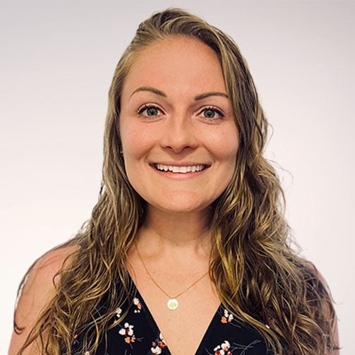 young blonde haired woman smiling headshot photo