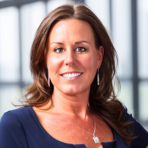 dark brown haired woman smiling headshot photo