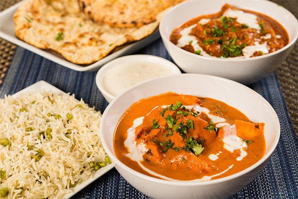 Thai red curry with a side of steamed rice.