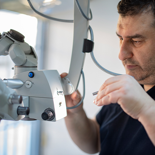 Technician working on repairing healthcare equipment.