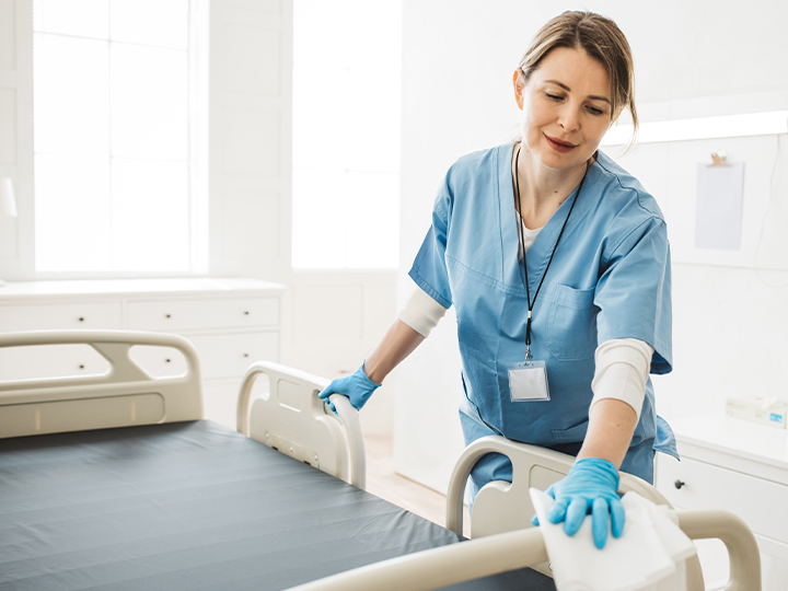 hospital-staff-wiping-bed