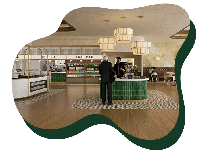 Modern café with green-tiled counter, hanging lights, and a "Grab & Go" section in the background.