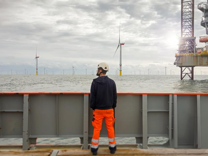 a worker looking at the sea