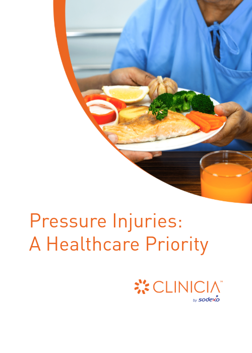 A healthcare worker serves a nutritious meal to a patient. Text overlay: ‘Pressure Injuries: A Healthcare Priority.
