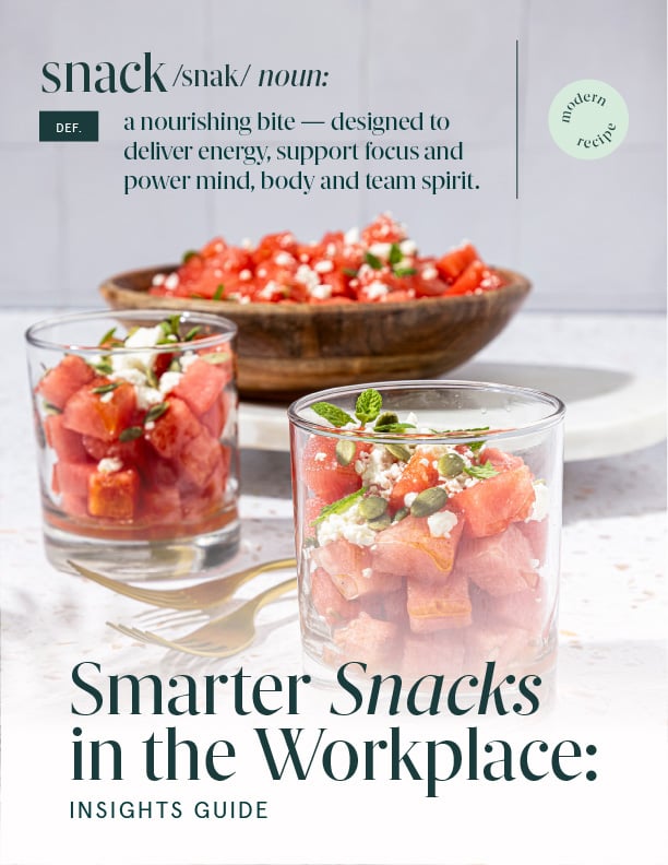 Printed Smarter Snacks in the Workplace Insights Guide displayed alongside an open booklet showing snack concepts, food photography, and informational content on a light background.