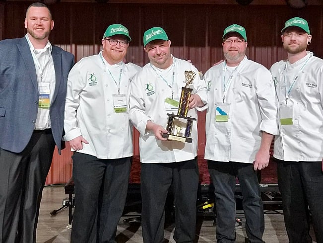 The Binghamton University dining team poses with their trophy at the 2026 SASA Conference Battle of the Chefs.