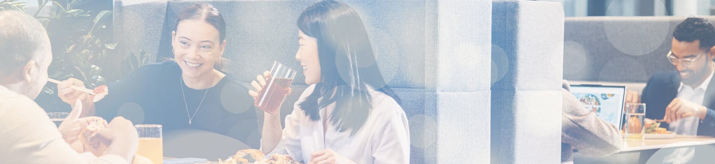busy restaurant scene with smiling people