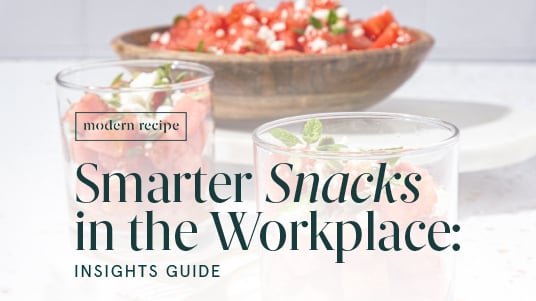 Cover image for workplace snacking guide featuring watermelon and yogurt parfaits with fresh fruit in background.