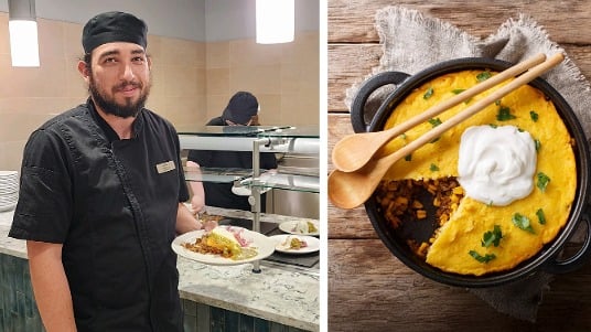 A chef at Colorado Mesa University holding a plated dish in the dining hall, alongside a homemade tamale pie casserole. 