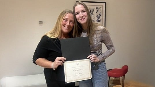 Sodexo Dining team members at SUNY Oneonta holding an award from the university’s 5th annual Pillar Awards.