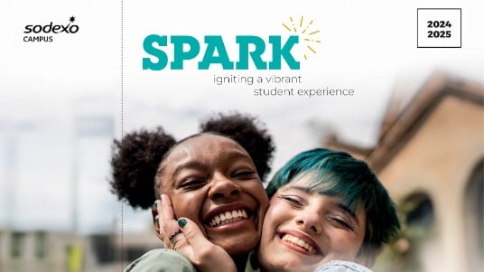 Spark magazine thumbnail showing two students smiling brightly.
