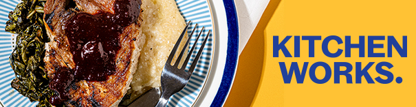Plated roasted meat with greens and rice beside a yellow background reading “KITCHEN WORKS.”