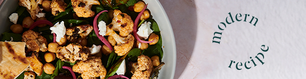 Roasted cauliflower and chickpea salad with greens and pita, with curved text reading “modern recipe”.