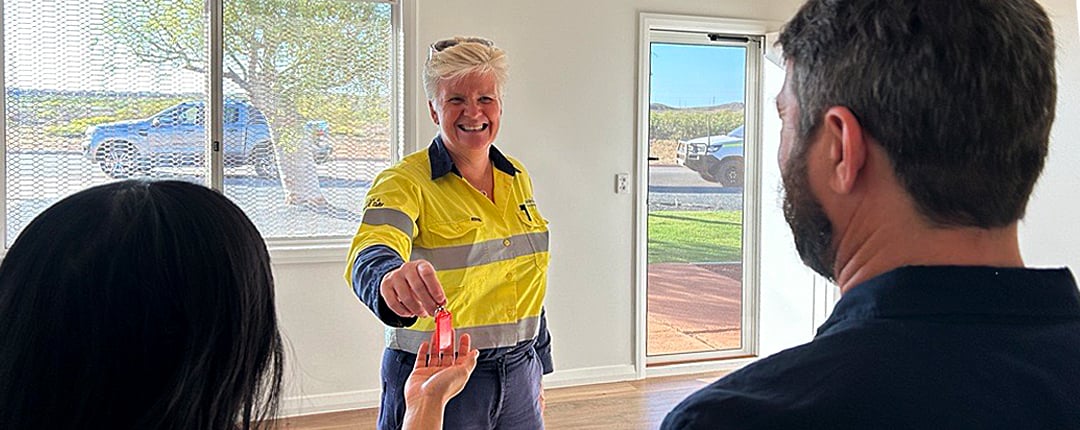 sodexo-employee-handover-key-of-refurbished-house