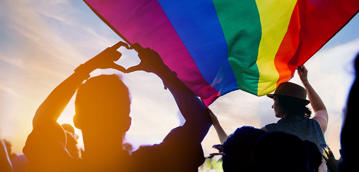 crowd-celebrating-with-pride-flag