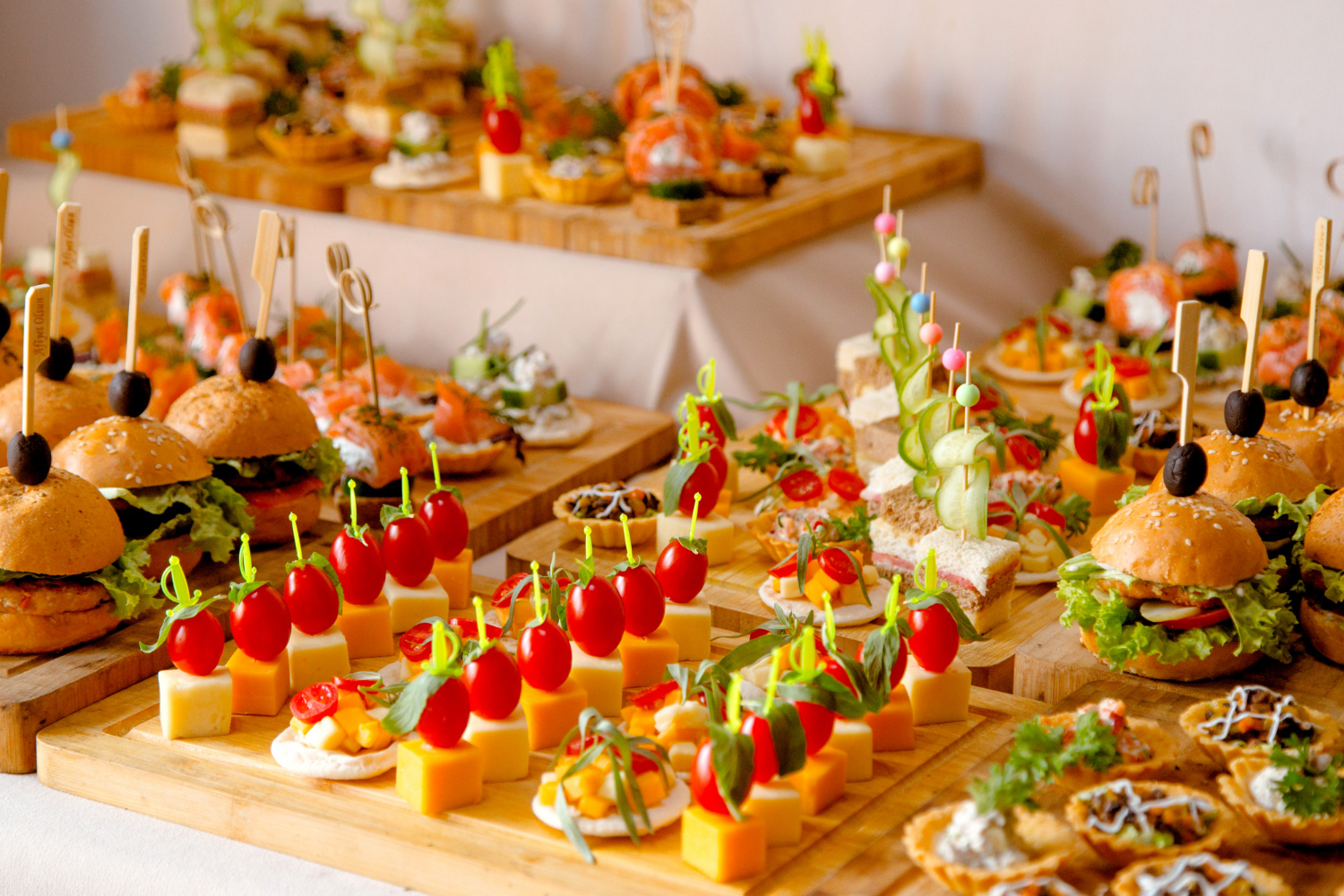 buffet-table-with-snacks-from-burgers-cheeses-etc