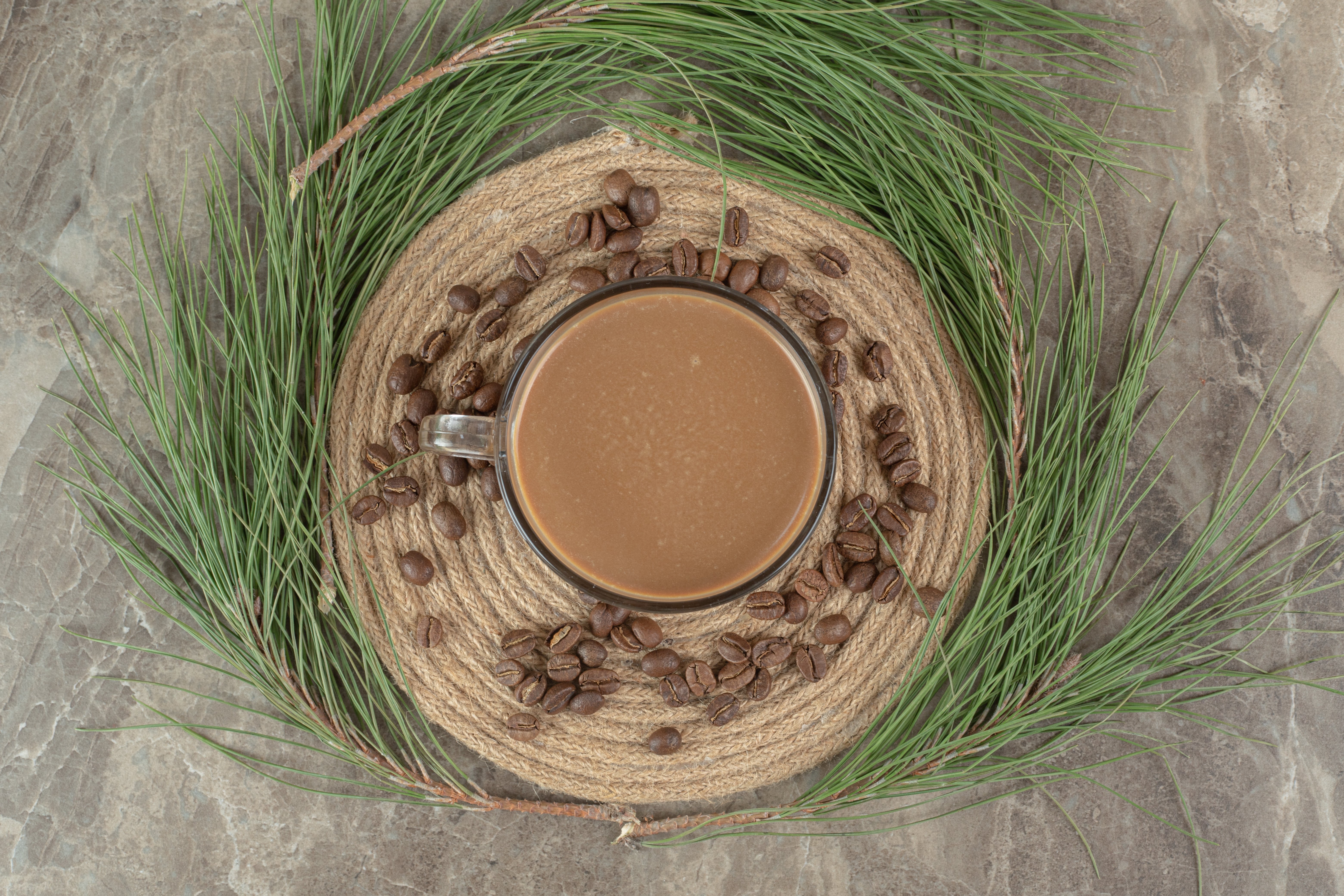 hot-coffee-pine-grass-and-coffee-beans-on-wood-pi-2023-11-27-05-31-09-utc