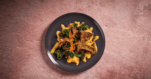 Urban Kale Slaw Salat von Sodexo kombiniert frischen Grünkohl und Toppings als Beispiel für Food Innovation.