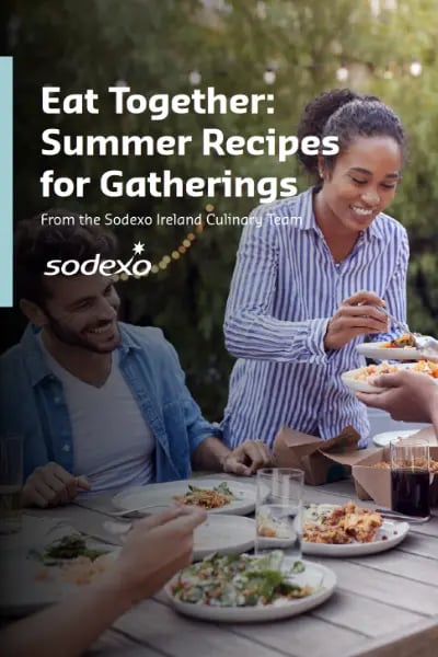 Cover image with text “Eat Together: Summer Recipes for Gatherings” showing people dining outdoors while one person serves food across the table.