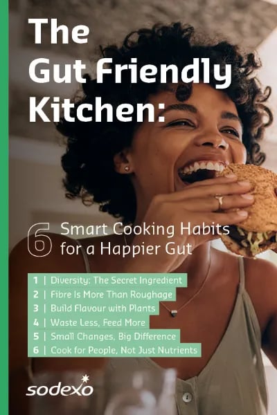 Cover of “The Gut Friendly Kitchen: 6 Smart Cooking Habits for a Happier Gut,” featuring a person eating a sandwich and a list of six gut-health cooking tips.