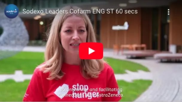Video thumbnail of a person in a red ‘Stop Hunger’ shirt speaking outdoors on a lawn, titled ‘Sodexo Leaders Cofarm ENG ST 60 secs