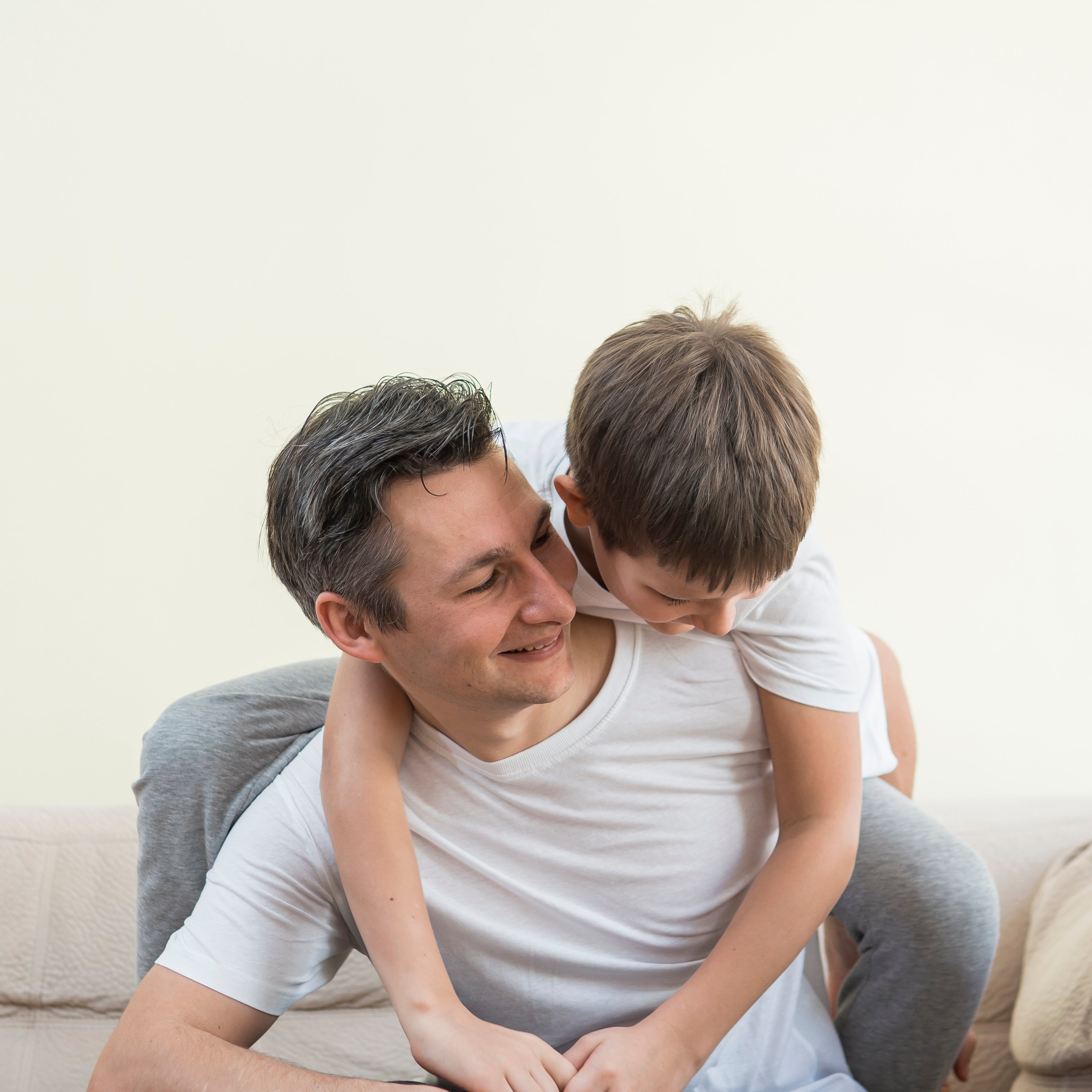 father-son-playing-living-room