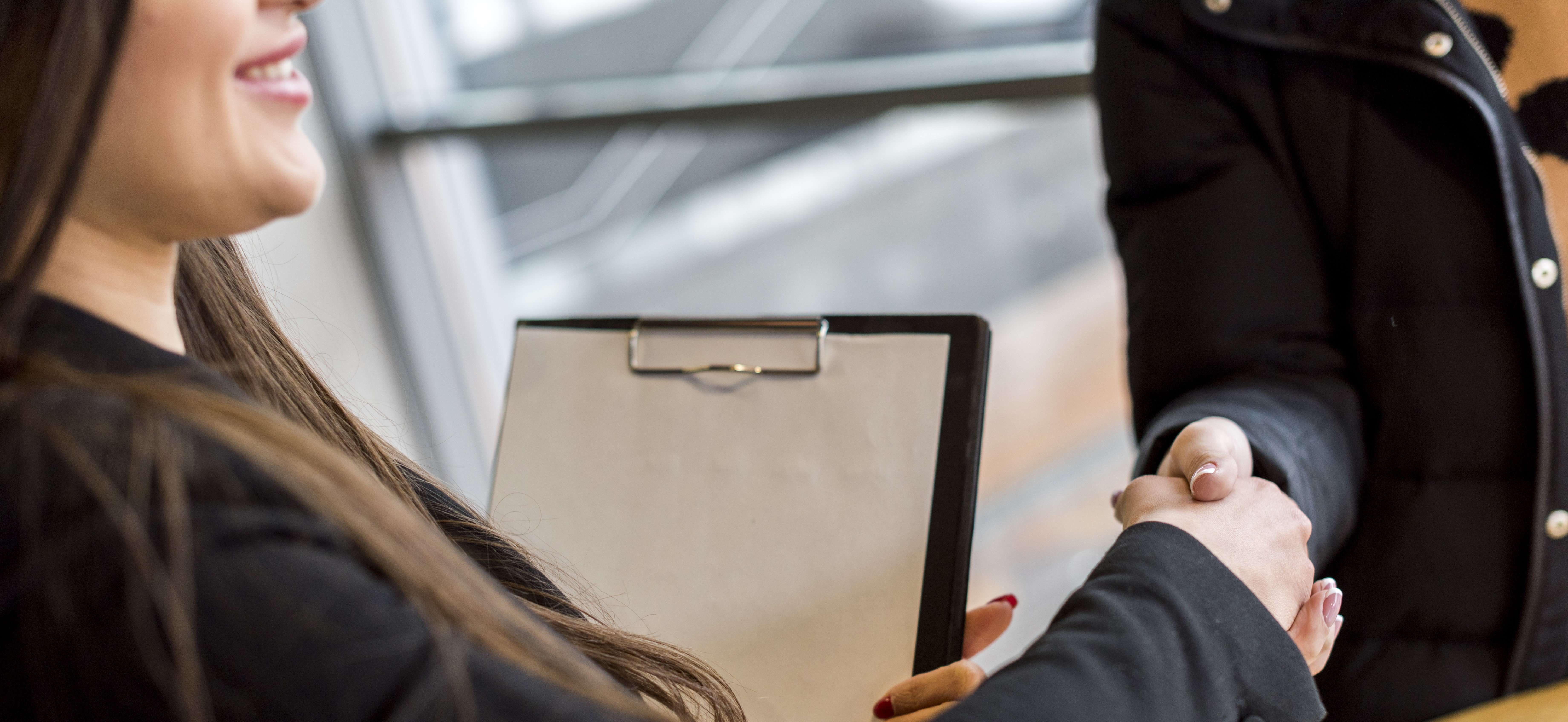 brunette-businesswoman-making-negotiation(1)