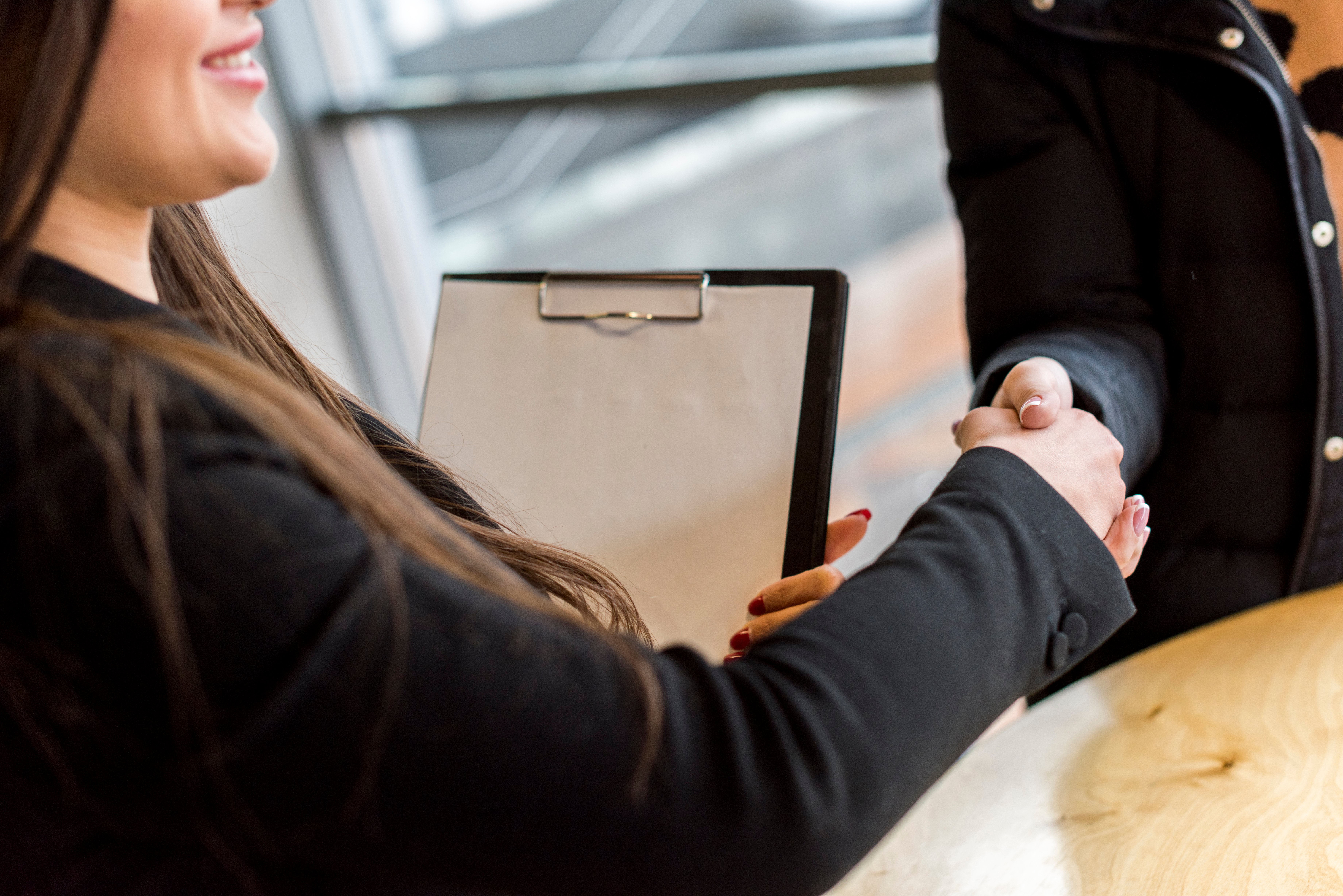 brunette-businesswoman-making-negotiation