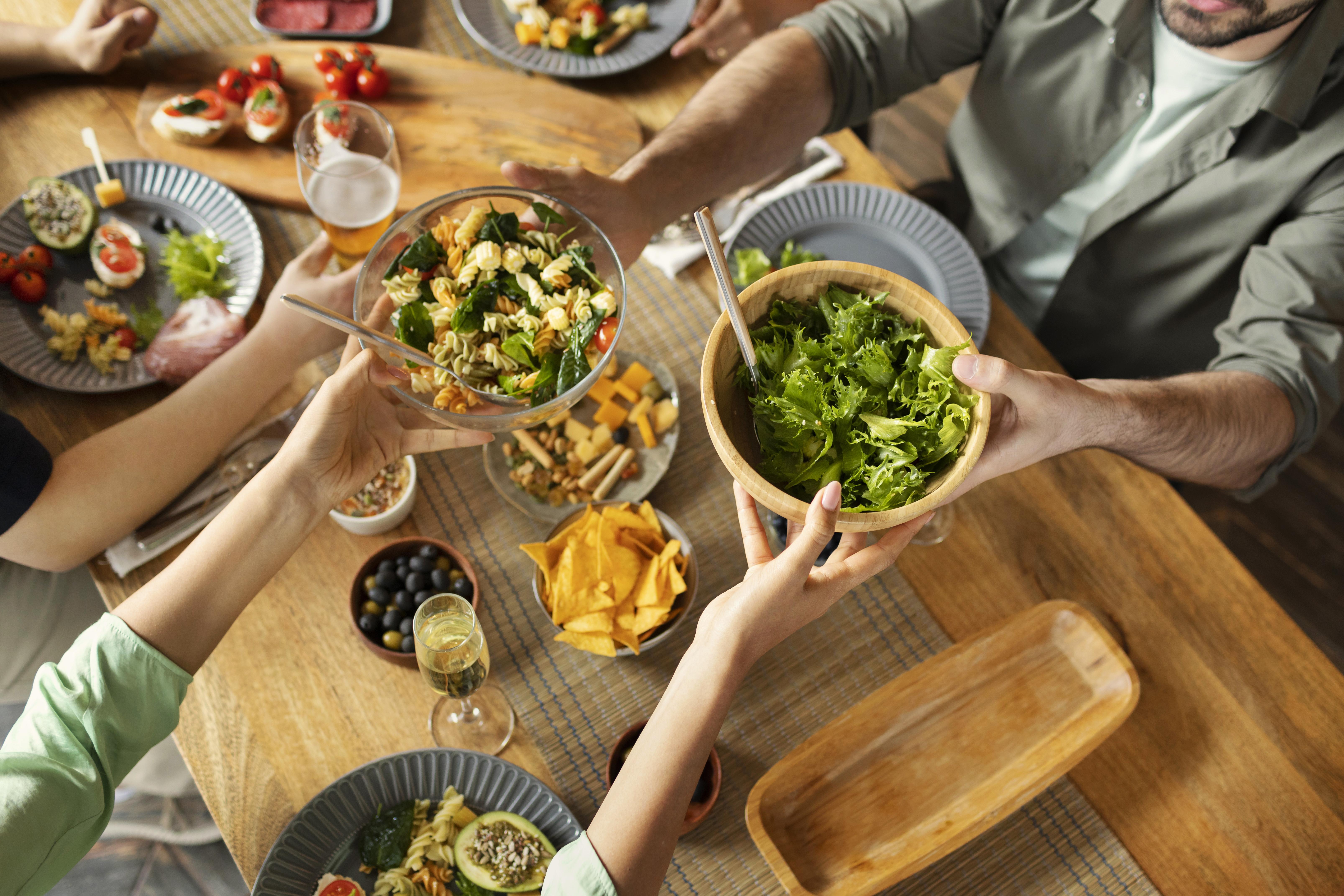 close-up-friends-with-delicious-salad