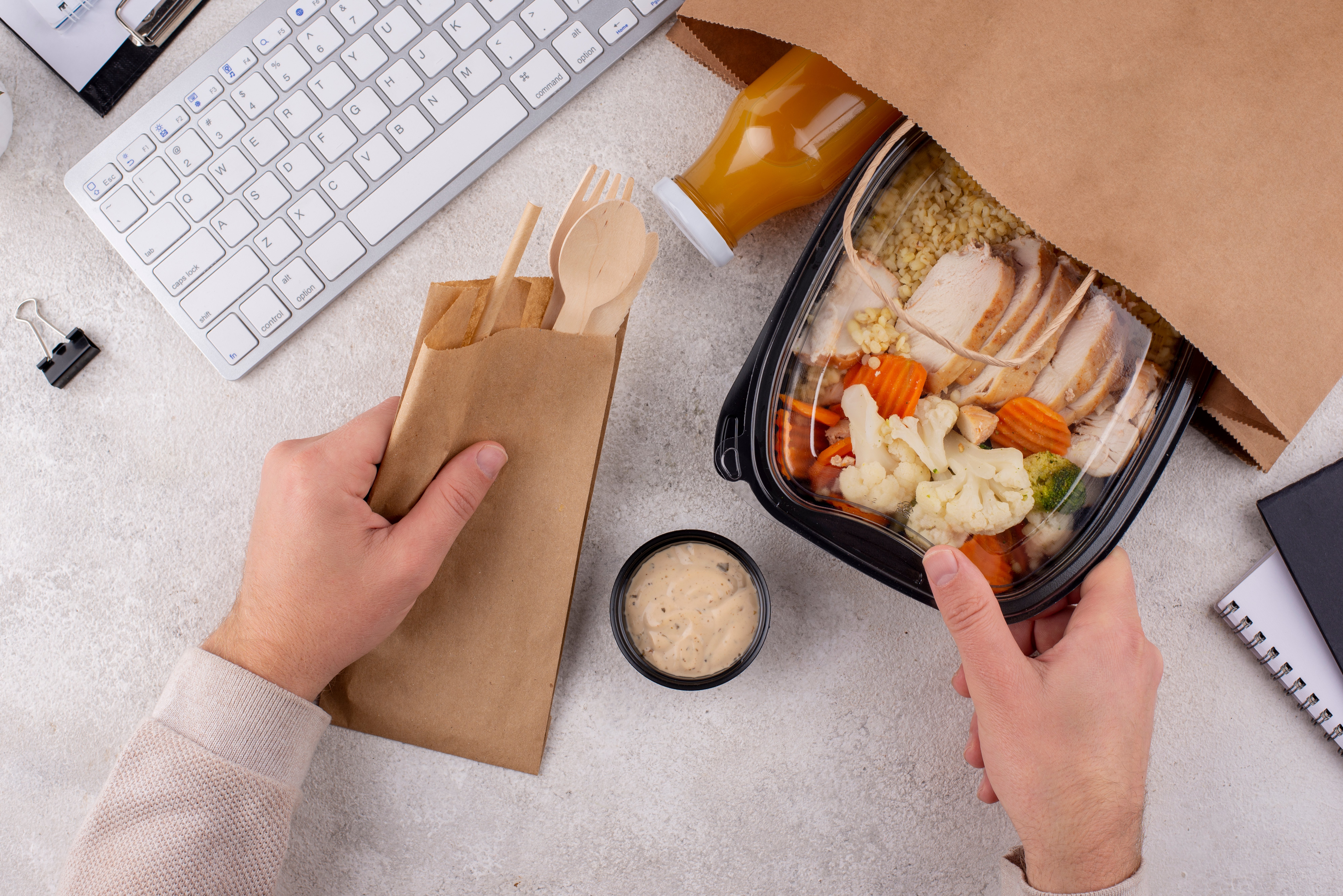 close-up-hands-holding-food-pack
