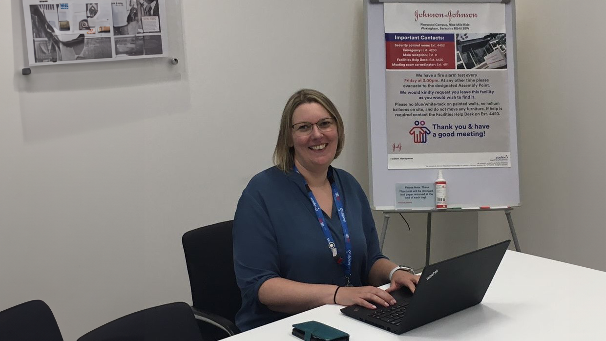 liz-gentry-sitting-at-desk-1240x698