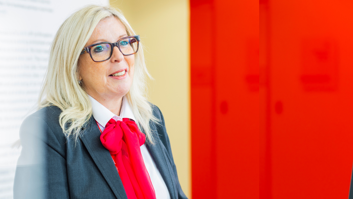 female-colleague-wearing-red-tie