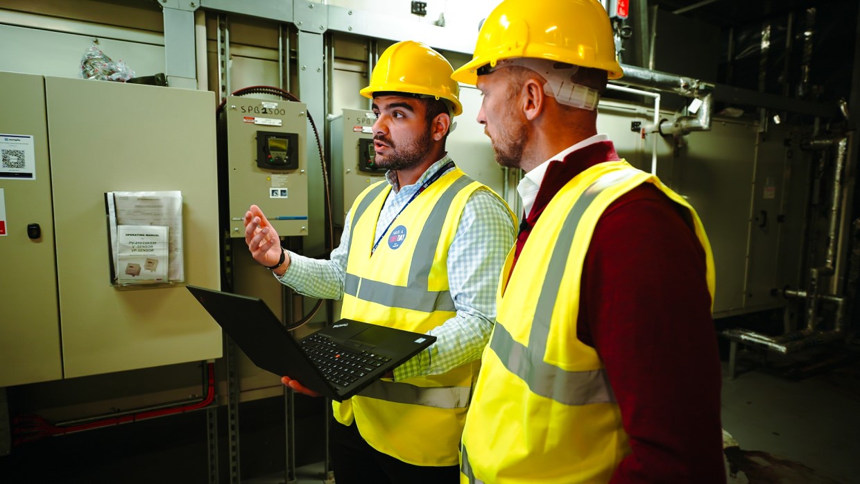 xempla-two-hard-hat-wearing-workers-1240x698