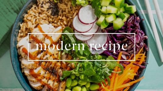 A colorful bowl filled with grilled chicken, rice, vegetables, and herbs, with the words ‘modern recipe’ overlaid on top