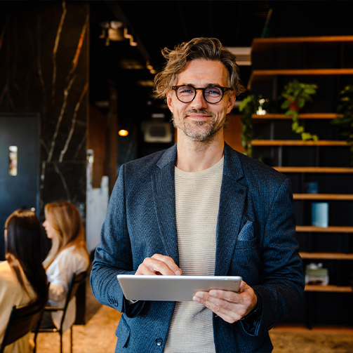 A man holding a tablet
