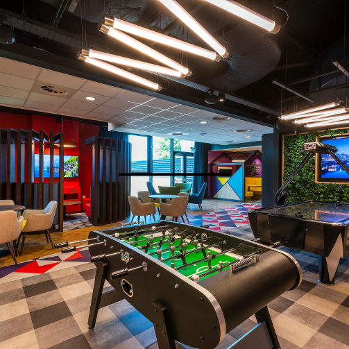 A futuristic office space with modern furniture, advanced technology, and a sleek design