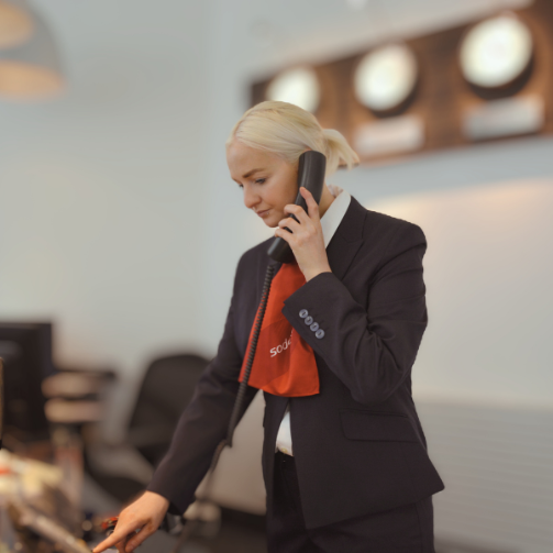 Sodexo employee calling at the reception desk