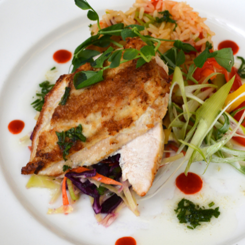 A delicious plate of food with a variety of colorful ingredients