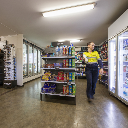 Remote worker walking in retail shop