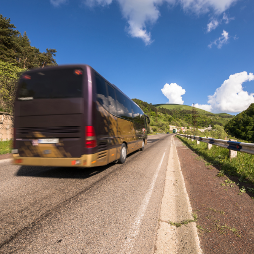 Bus driving on a remote road