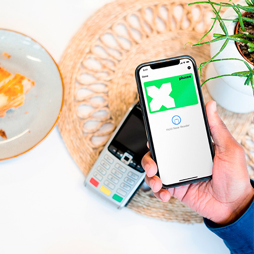 A mobile phone shhowing a Pluxee's digital payment service