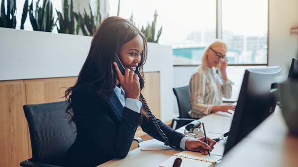 A woman on the phone in an office
