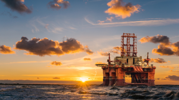 Offshore rig under sunrise